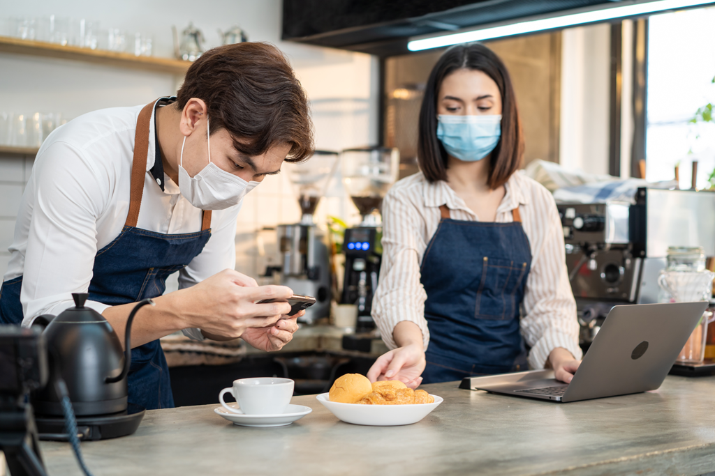 asian barista couple enjoy doing digital marketing 2021 12 09 12 52 31 utc